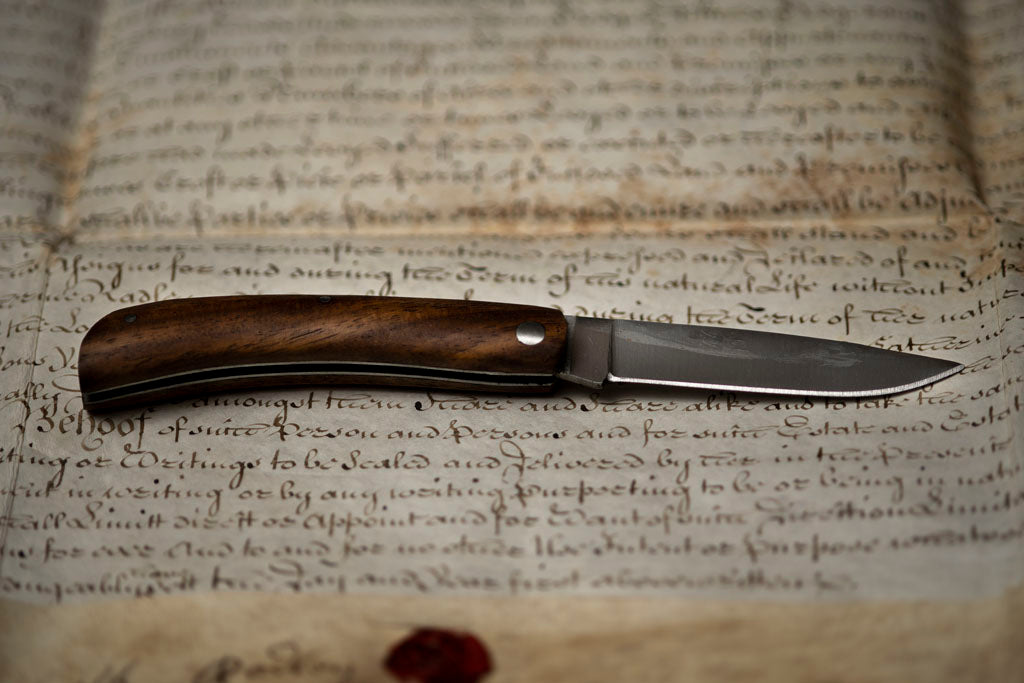 https://www.samsonhistorical.com/cdn/shop/products/Standard-Pocket-Knife-Wood-Handled_1200x.jpg?v=1665167531